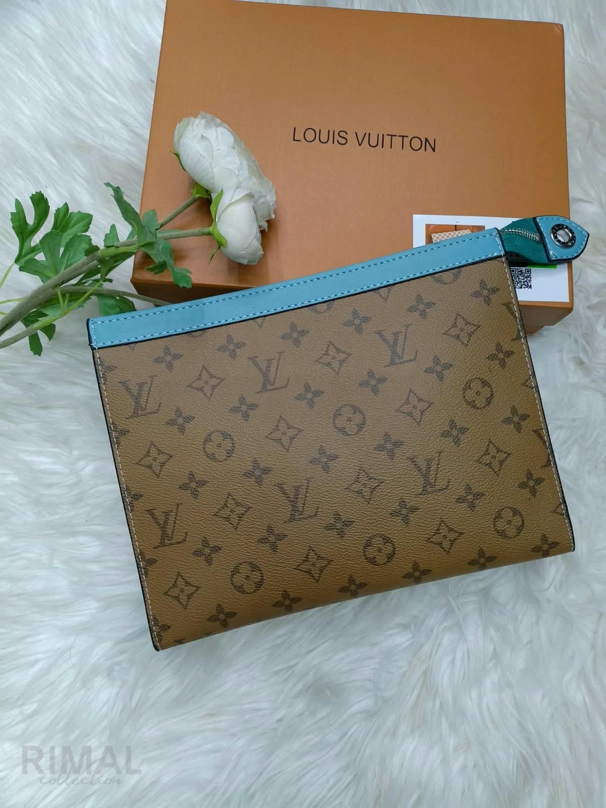 Louis Vuitton – Pochette Voyage Souple