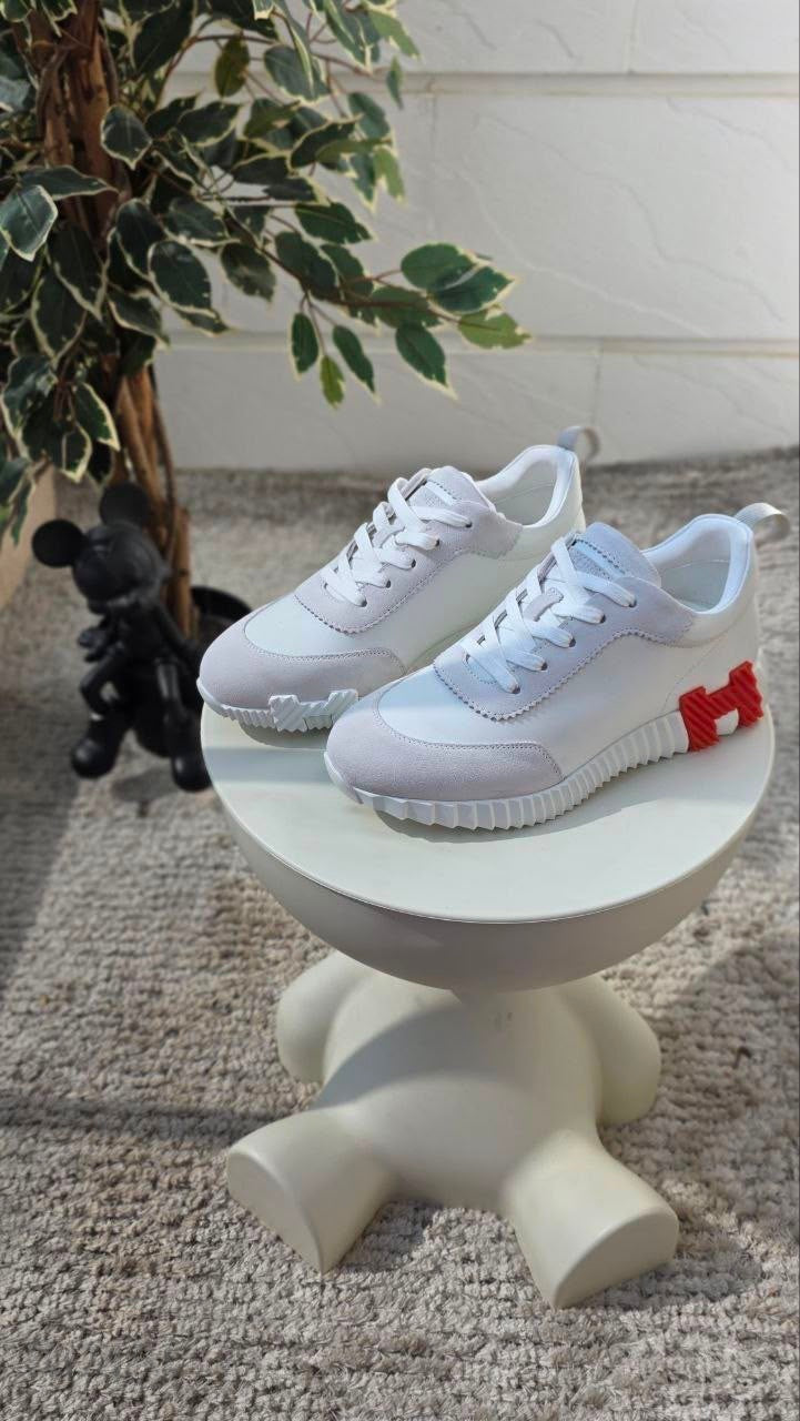 HERMÈS Bouncing Sneakers - Blanc White Leather & Suede Orange H Logo Low-Tops