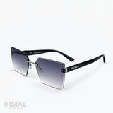 Prada — Oversized Statement Sunglasses