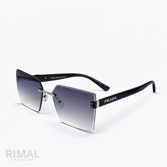 Prada — Oversized Statement Sunglasses