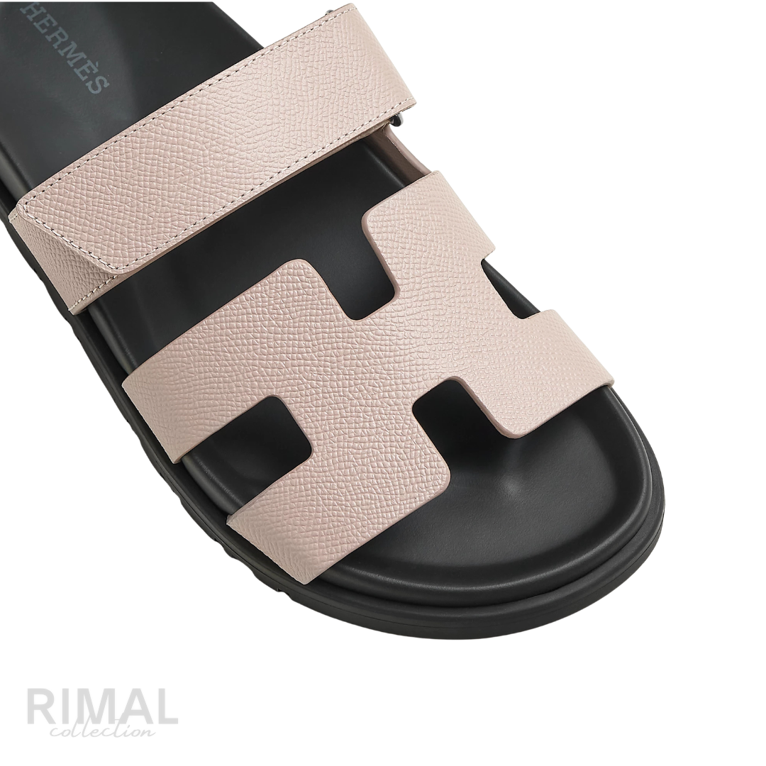 HERMÈS Chypre Sandals Grained Leather Pale Pink Rose Porcelaine Black Sole