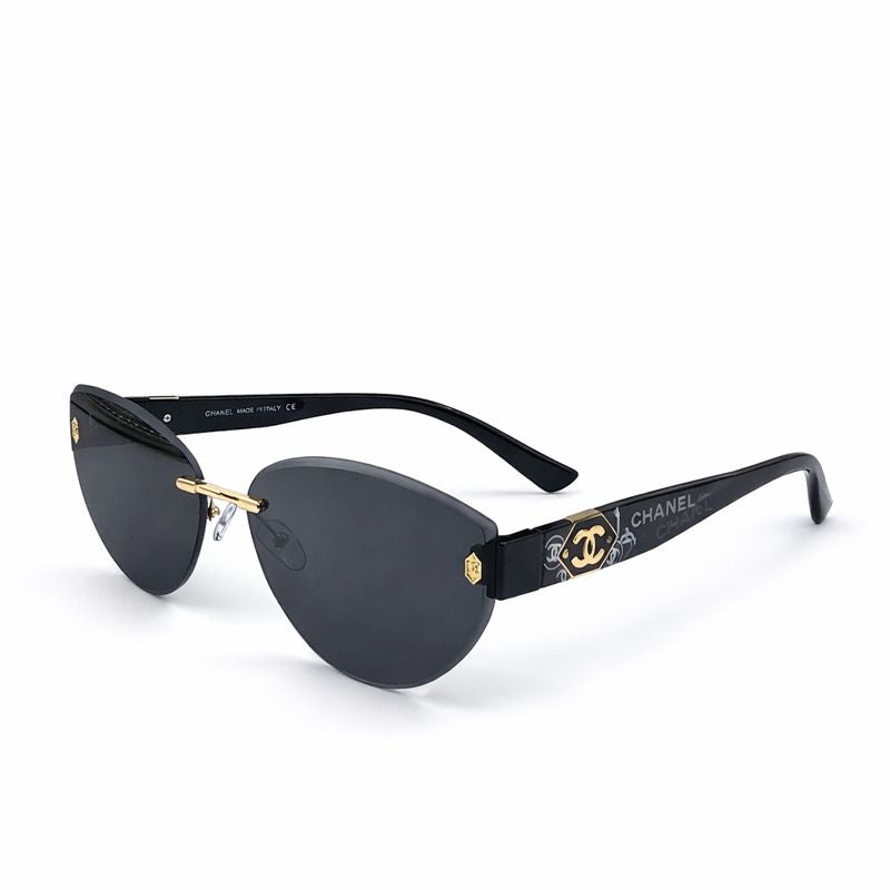 Chanel — Tortoise Sunglasses
