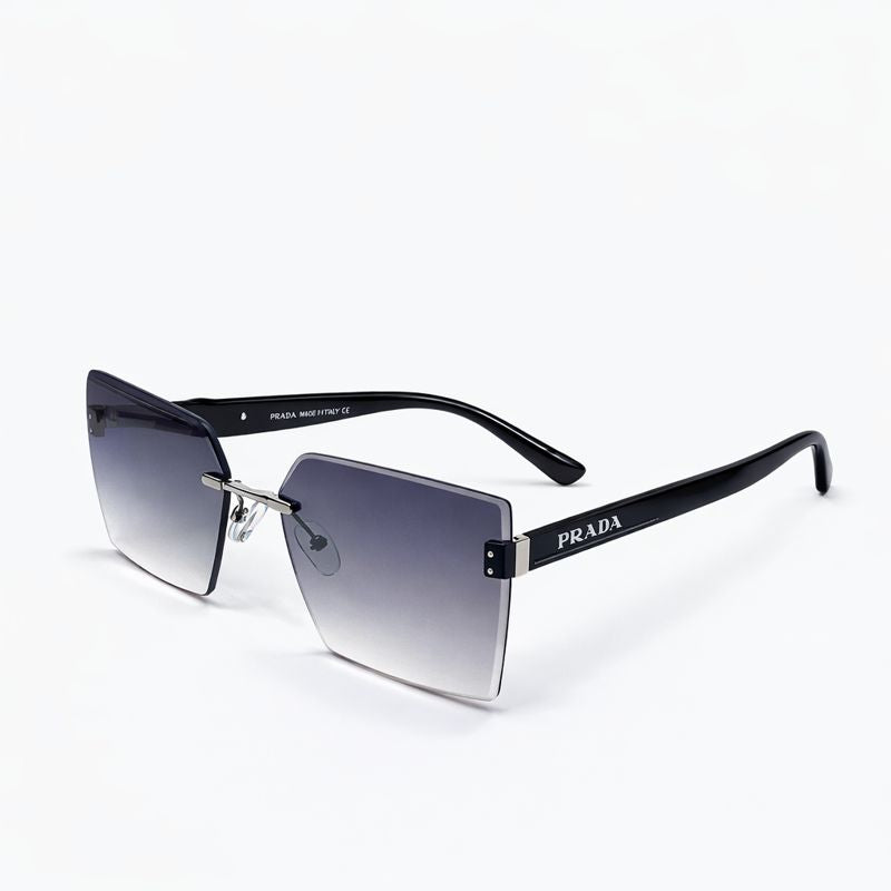 Prada — Oversized Statement Sunglasses