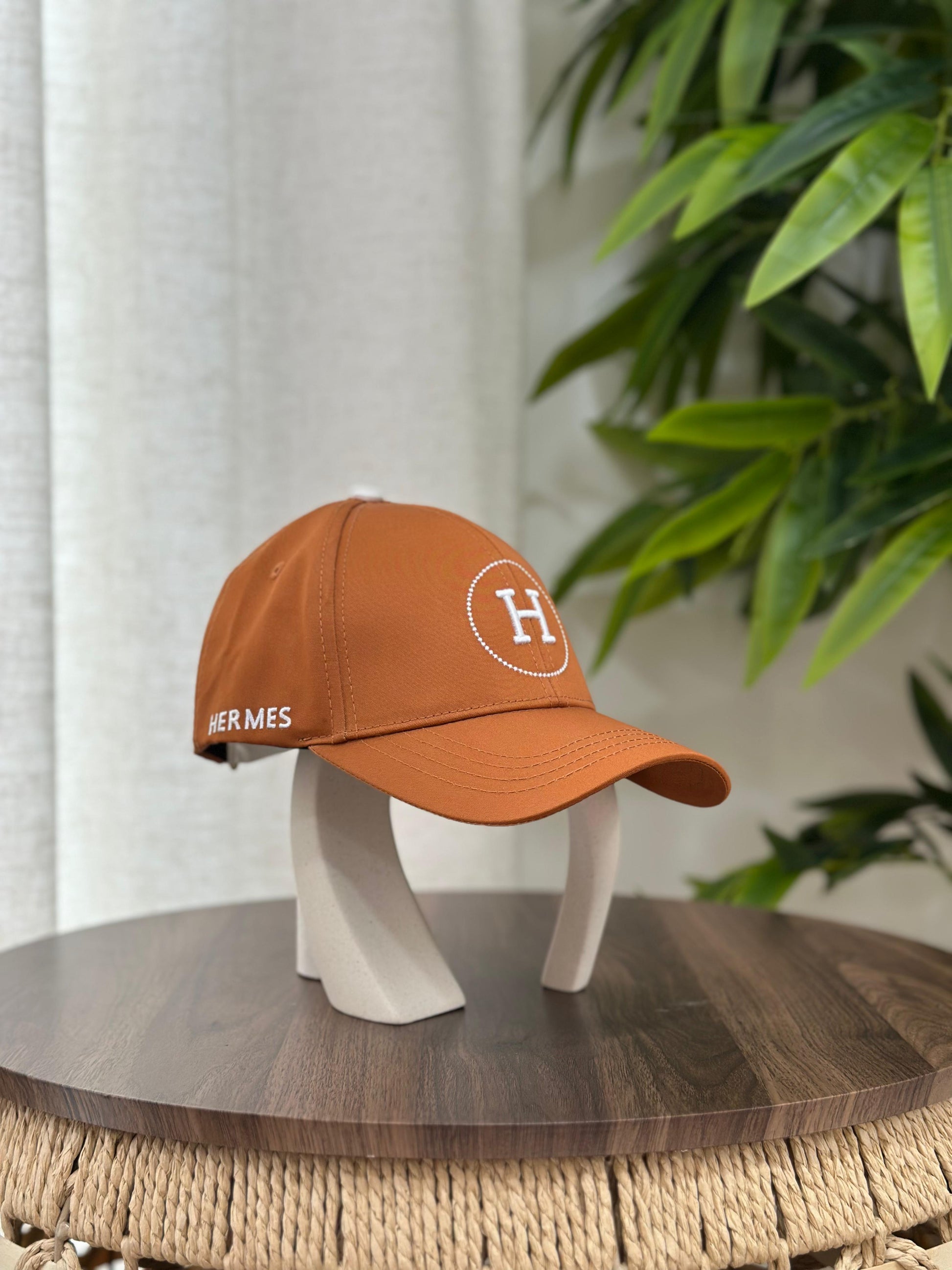 Hermès | Nevada H Cap – Noir / Orange – Product Image 1