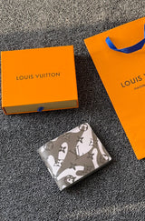 Louis Vuitton | Multiple Chalk Zebra Wallet – Black / White / Blue