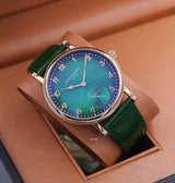 Patek Philippe | Complications Sun Moon Open Heart Watch – Emerald Green