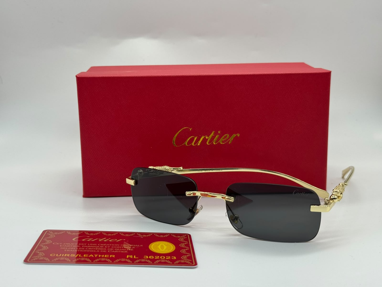 Cartier | Panthère de Cartier Rimless Sunglasses – Gold / Dark Grey – Product Image 1