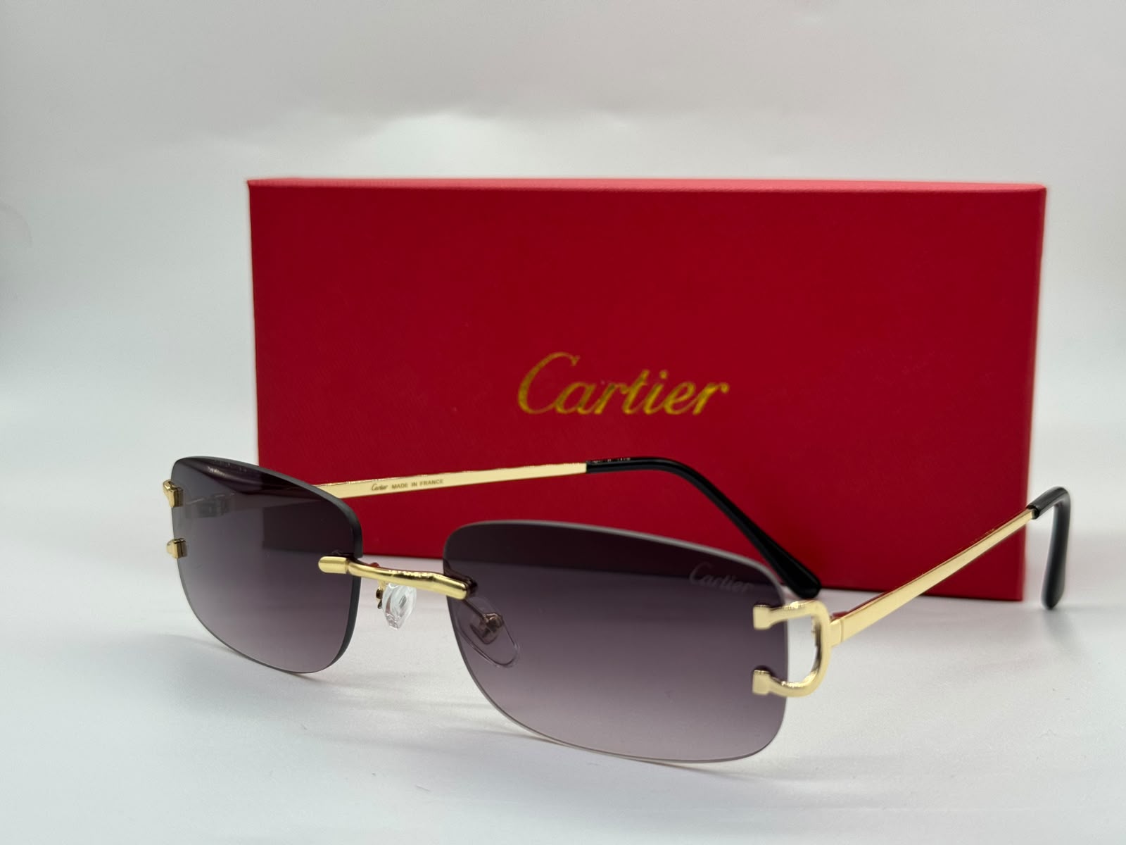 Cartier | Panthère de Rimless Rectangular Glasses – Gold / Clear – Product Image 1