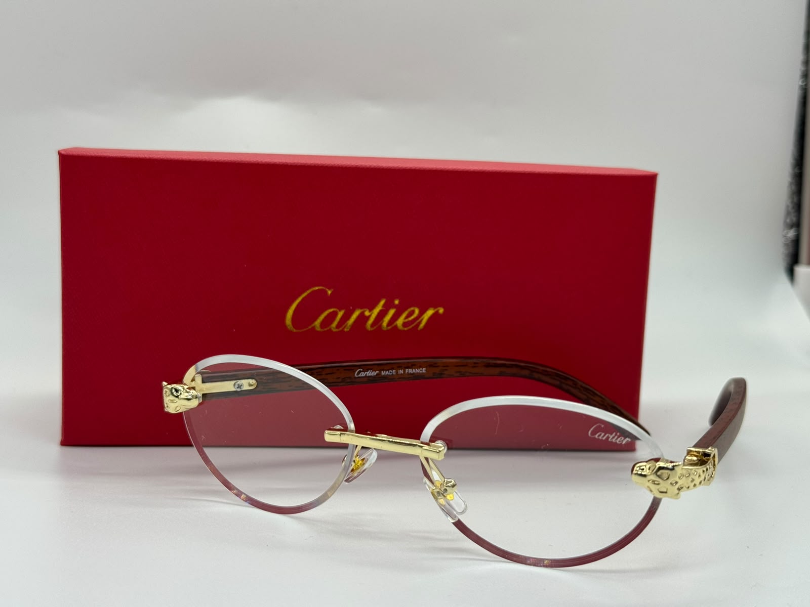 Cartier | Signature C de Cartier Rimless Sunglasses – Gold / Brown Gradient – Product Image 1