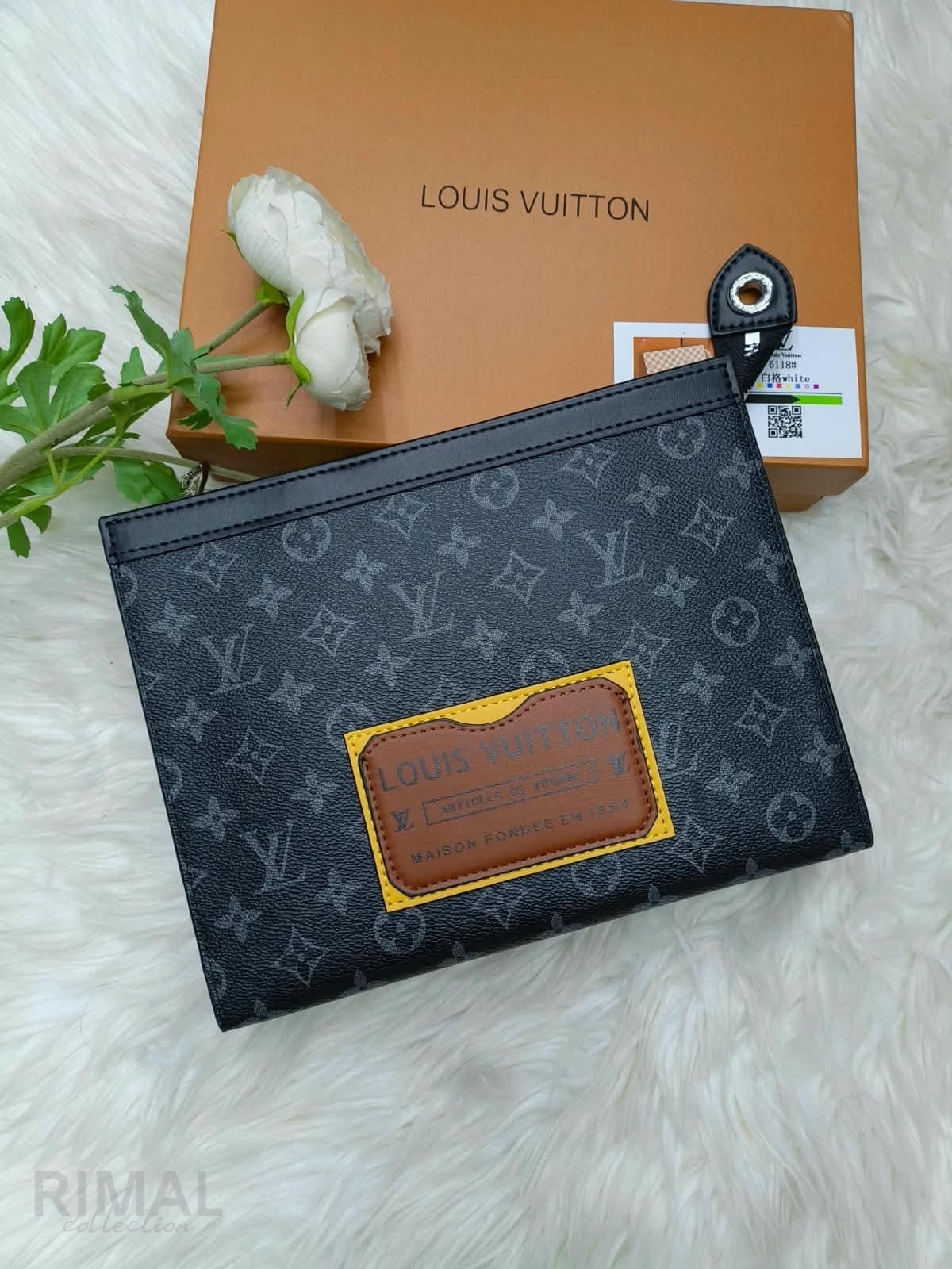 Louis Vuitton – Monogram Eclipse with Yellow Gaston Label Patch